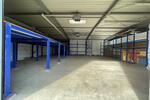 Lagerhalle 531m² | Lagerfläche mit WC | Rolltor | Regale zimmer