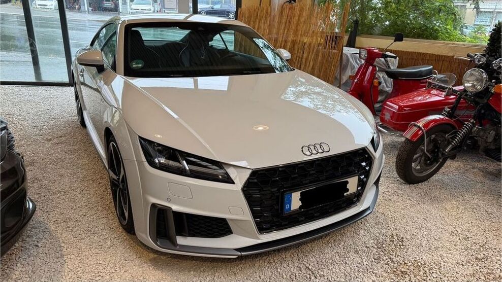 TT
