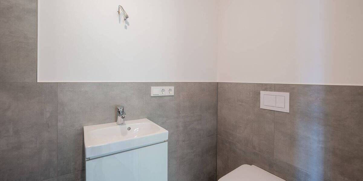 Architektur trifft Achtsamkeit: Stilvolle Etagenwohnung mit Bergblick, Terrasse & grüner Technik 3 zimmer