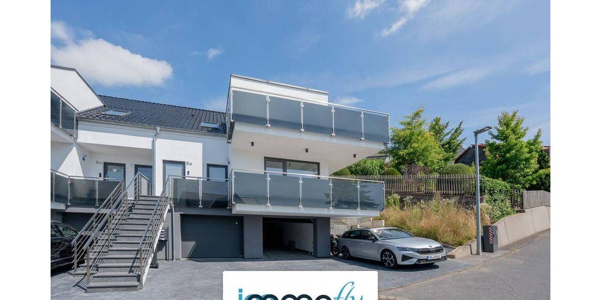 Architektur trifft Achtsamkeit: Stilvolle Etagenwohnung mit Bergblick, Terrasse & grüner Technik 3 zimmer