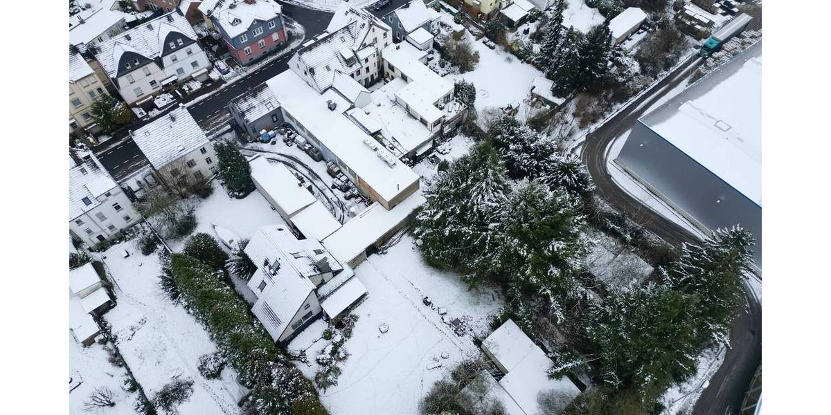 Baugrundstück mit mehreren Wohn- und Gewerbebestandsgebäuden zimmer
