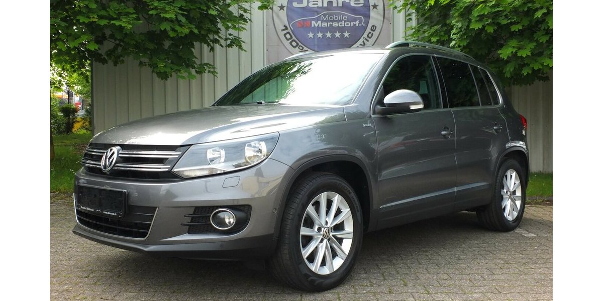 VW Tiguan WM26:LIFE NAVI AHK PARKPILOT SHZ BLUETOOTH 124.710 km 11.904 &euro; Köln 50858