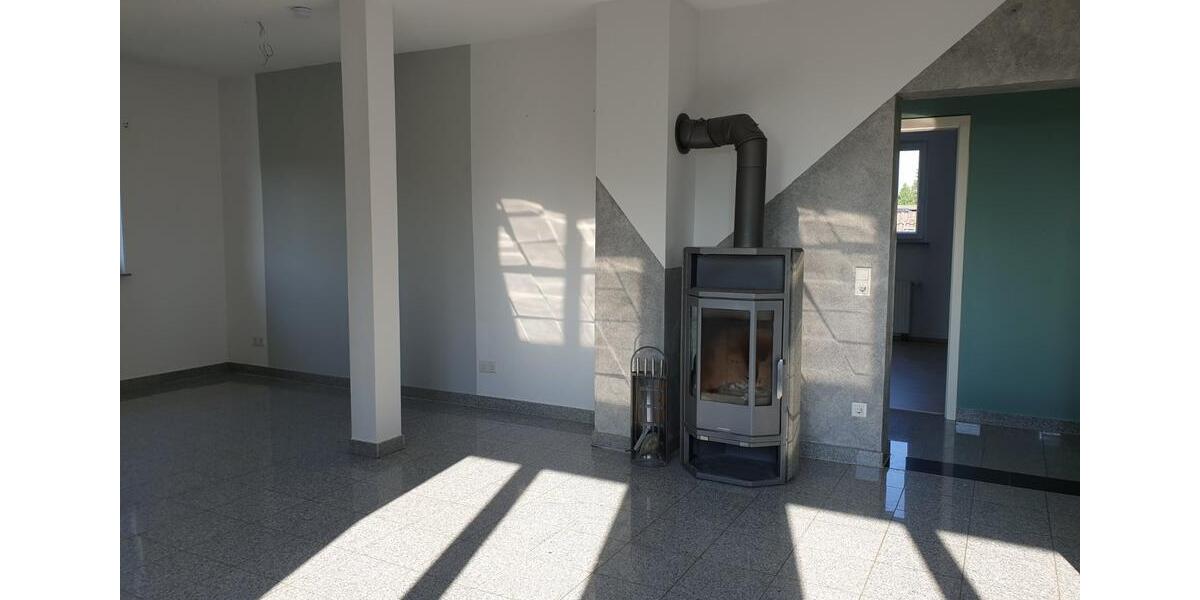 Schöne Dachgeschosswohnung mit Kamin und Terrasse 3 zimmer