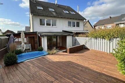 Charmante Doppelhaushälfte mit Wintergarten, Garten und vielseitigen Nutzungsmöglichkeiten 5 zimmer