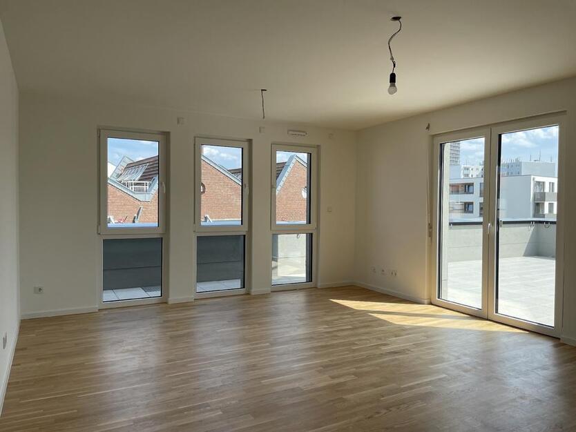 Lichtdurchflutete Wohnung mit Dachterrasse und offener Grundrissgestaltung zimmer