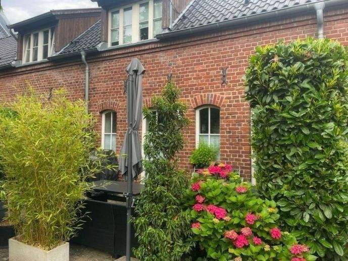 Lichtdurchflutete-2,5-Zi-Terrassenwohnung-mit-Garten-im-exclusiven-Vierkanthof 2 zimmer