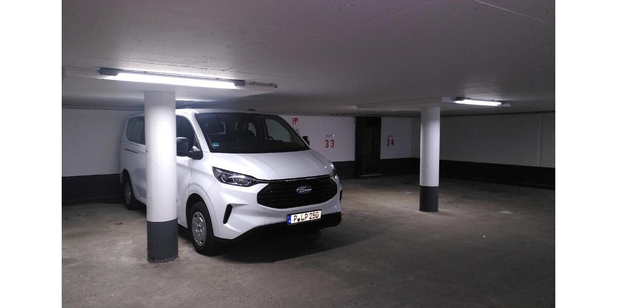 Drei gut vermietete Eigentumswohnungen und Tiefgaragenstellplätze 1 zimmer