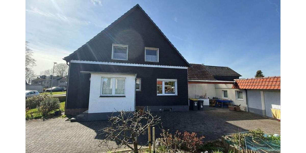 Charmante Doppelhaushälfte mit Hobbyraum, Garagen und idyllischem Garten in Mettmann 1 zimmer