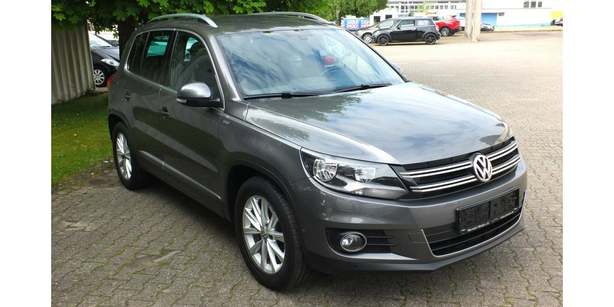 VW Tiguan WM26:LIFE NAVI AHK PARKPILOT SHZ BLUETOOTH 124.710 km 11.904 &euro; Köln 50858