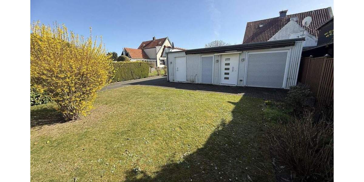 Charmante Doppelhaushälfte mit Hobbyraum, Garagen und idyllischem Garten in Mettmann 1 zimmer