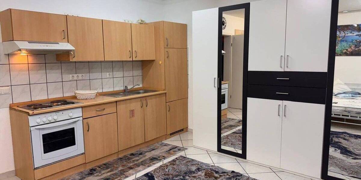 Modern Apartment mit Küche und Möbel in beste Lage 1 zimmer