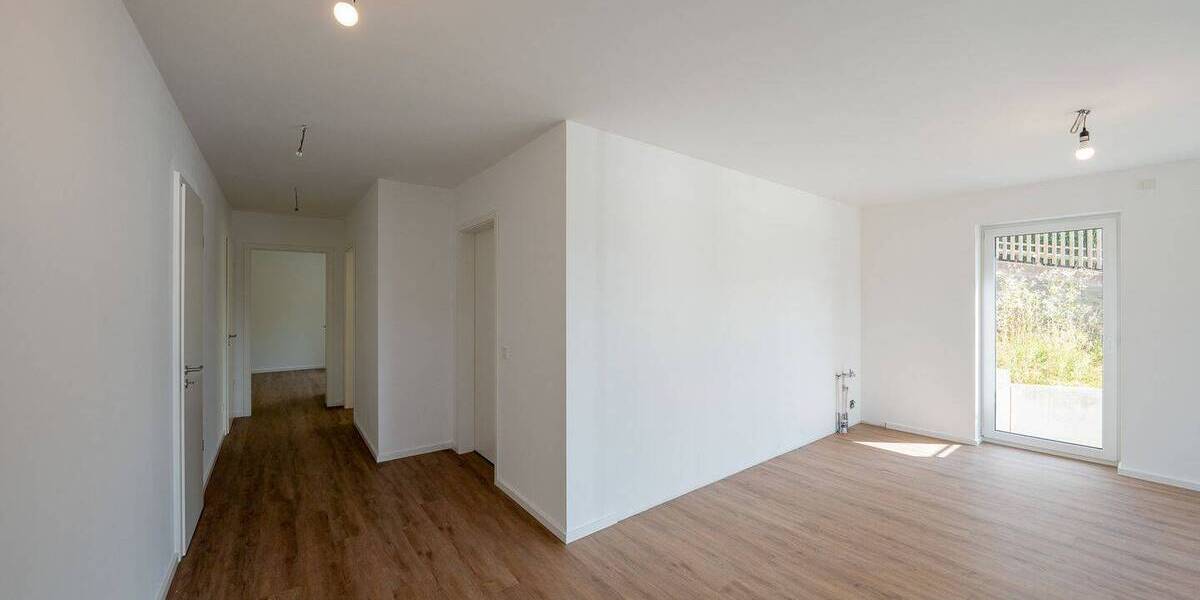 Architektur trifft Achtsamkeit: Stilvolle Etagenwohnung mit Bergblick, Terrasse & grüner Technik 3 zimmer