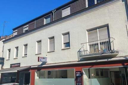 Mehrfamilienhaus + Bungalow in zentraler Lage mit Garagen + Stellplätzen und Entwicklungspotential 1 zimmer