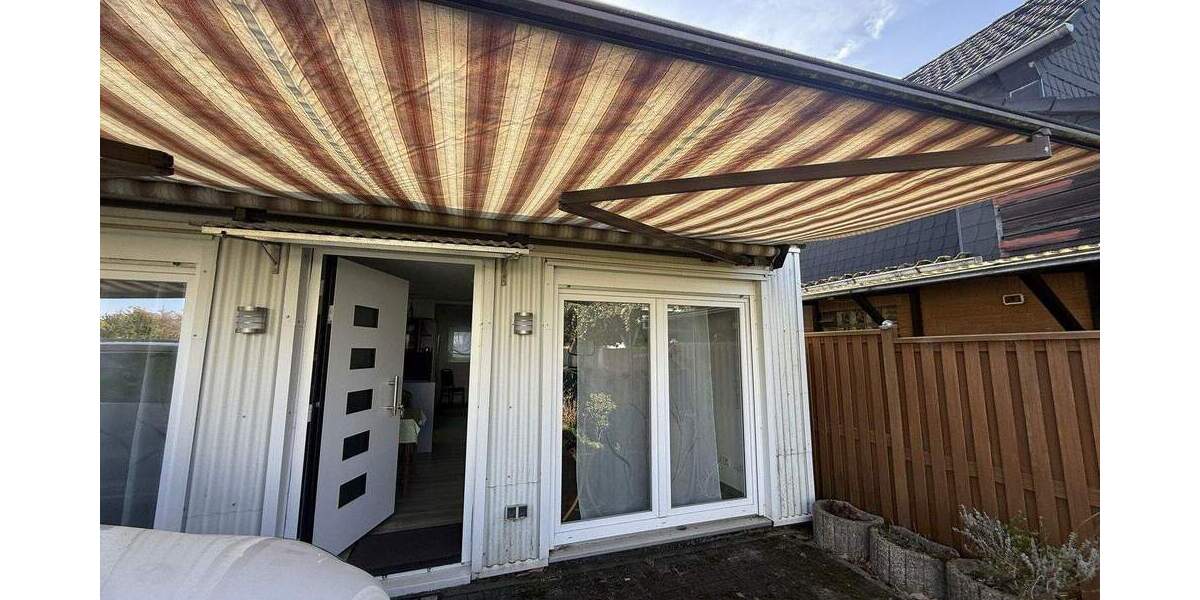 Charmante Doppelhaushälfte mit Hobbyraum, Garagen und idyllischem Garten in Mettmann 1 zimmer