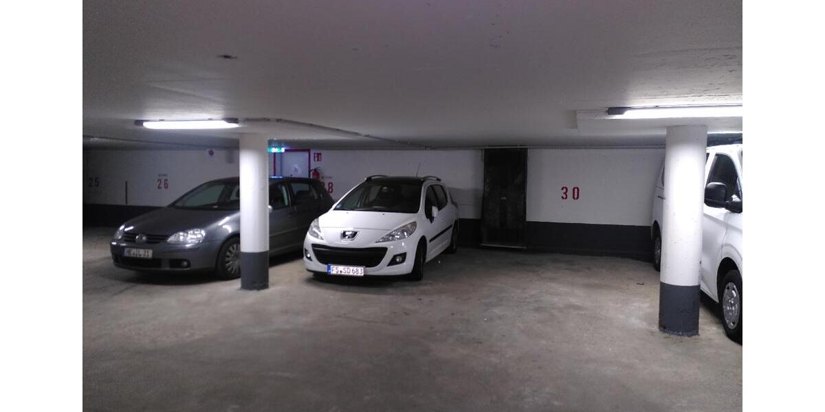 Drei gut vermietete Eigentumswohnungen und Tiefgaragenstellplätze 1 zimmer