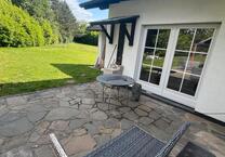 Wohnung mit 2 Terrassen und Garten